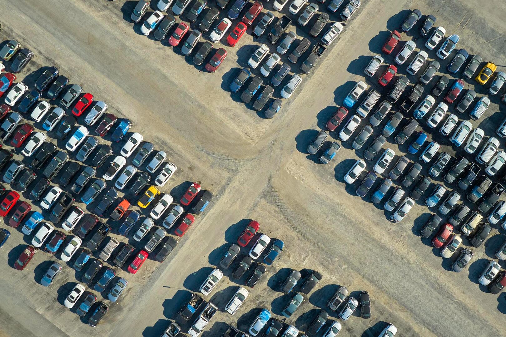 Big parking lot with parked used cars