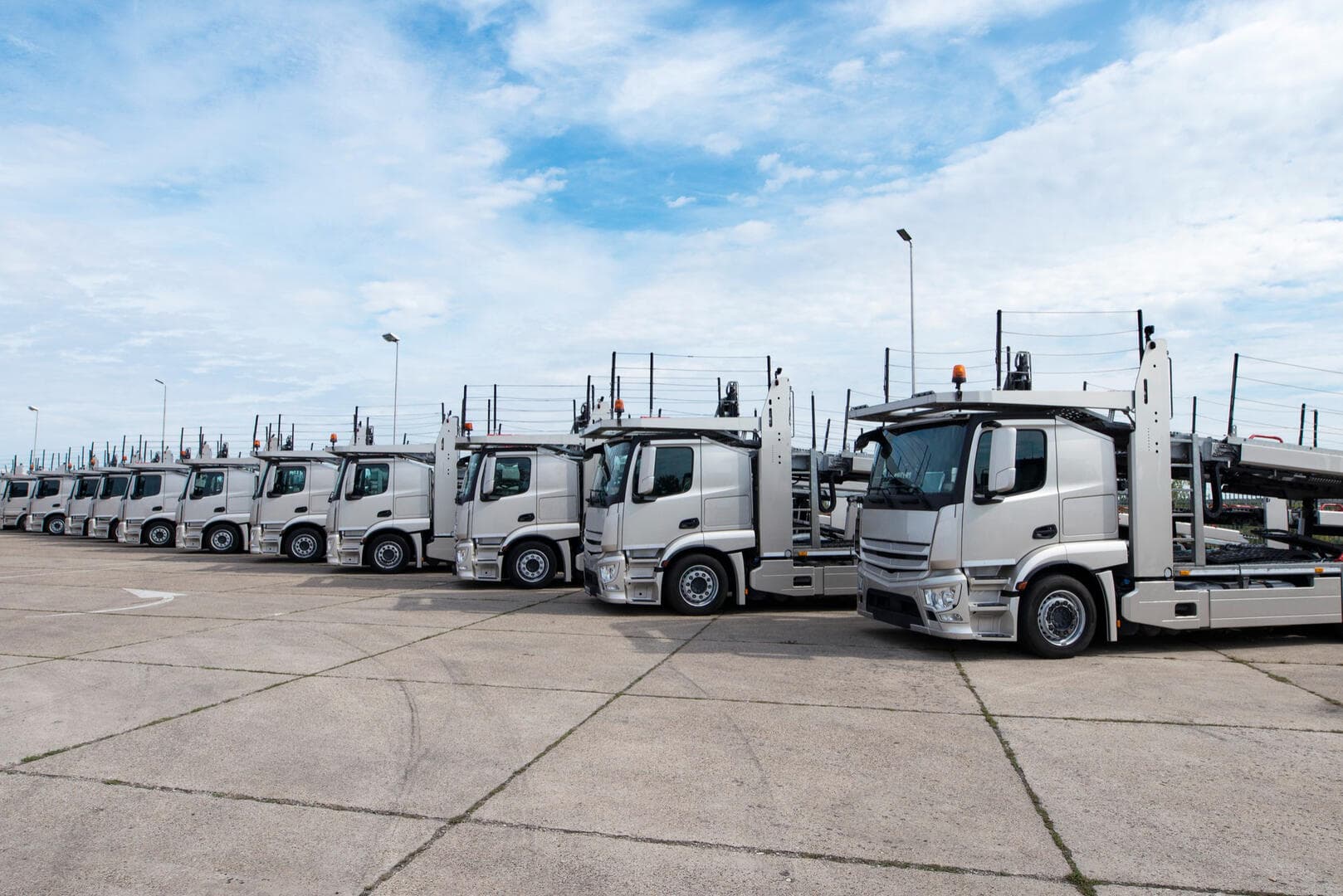 Car carrier truck parked in a line