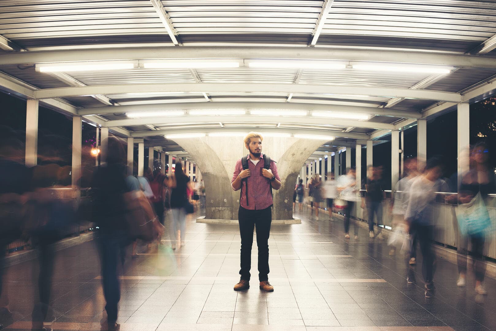 Men standing in the subway